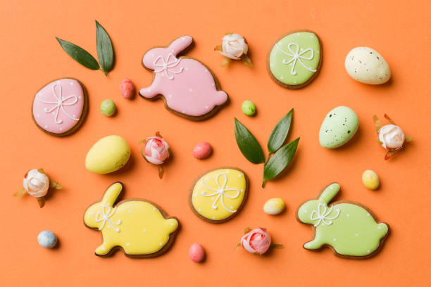istock Happy Easter concept. Preparation for holiday. Easter eggs on colored background. flat lay top view copy space banner 1475794816