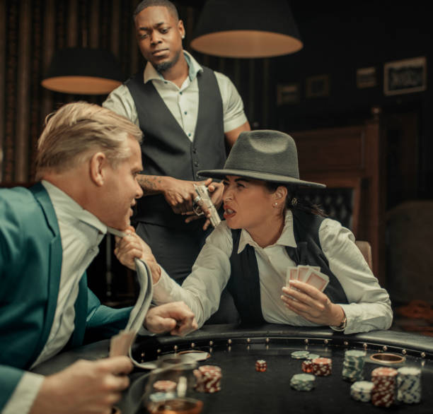 istock Gangster gun violence at the poker table 1475795556