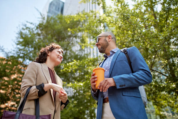 istock Corporate colleagues talking outdoors 1475795657