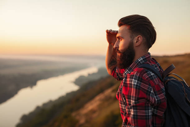 istock Bearded tourist looking at distance 1475800565
