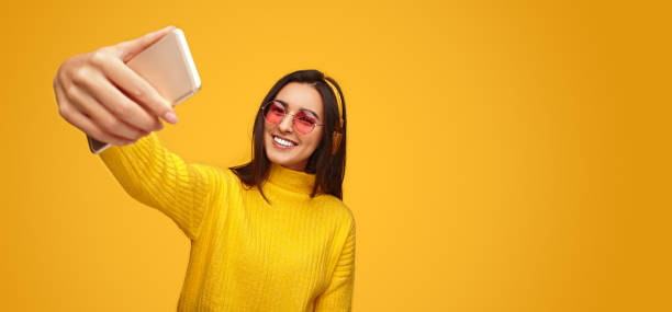 istock Happy young meloman taking selfie 1475804347