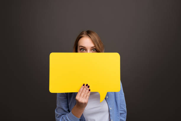 istock Shocked woman covering face with speech bubble 1475804457