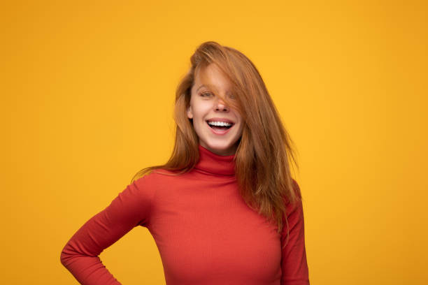 istock Cheerful young female with red hair 1475805850