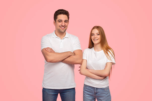 istock Confident girlfriend and boyfriend with crossed arms 1475813163