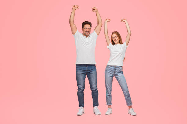 istock Young couple celebrating success together 1475813198