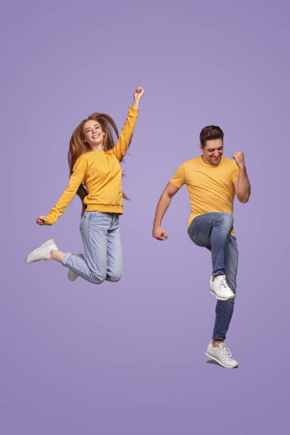 istock Young couple celebrating success together 1475813232