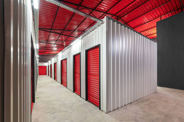 istock Corridor of self storage unit with red doors. Rental Storage Units 1475819725