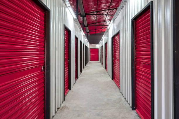 istock Corridor of self storage unit with red doors. Rental Storage Units 1475820040
