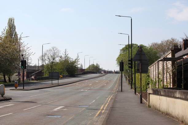 istock Empty road in the uk during lockdown 2020 1475820265