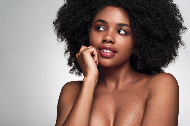 istock Dreamy African American woman during spa session 1475825109
