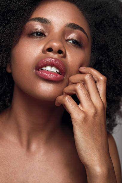 istock Displeased black woman scratching face 1475825136