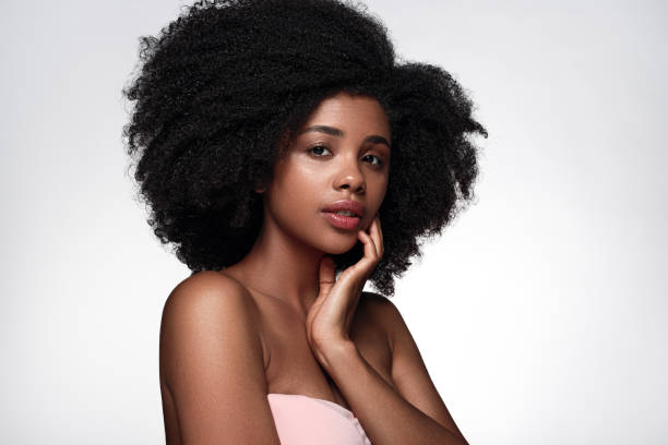 istock Black woman in bra during spa session 1475825220