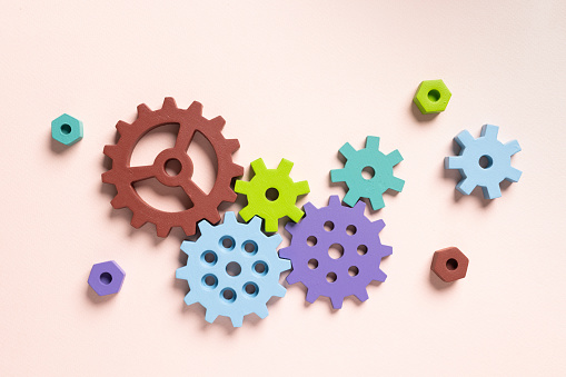 Top view of colorful gears. Corporate work and modern business process concept. High quality photo