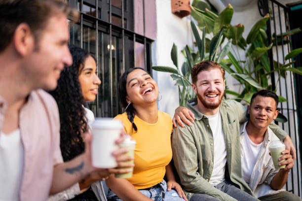 Happy friends talking outdoors