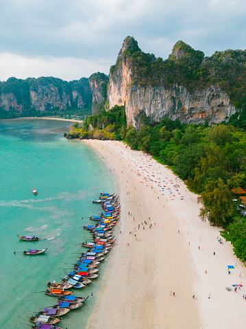 Scenic aerial view  of long tails boats on Railey beach in  Krabi Province, Thailand
