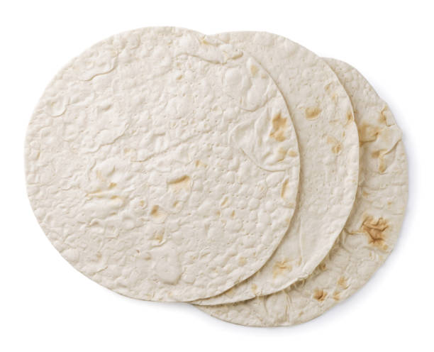 istock Round pita bread on a white background. Top view 1475847256