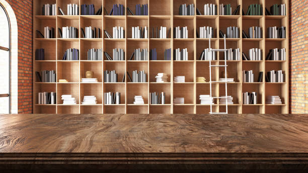 istock Empty Wooden Desk with a Library as a Background 1475859491