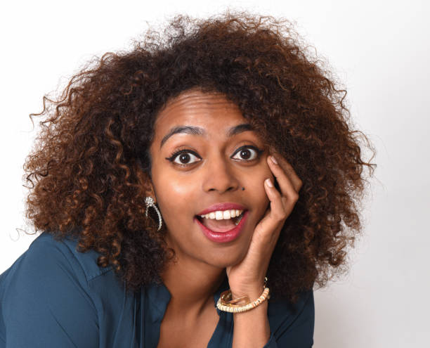 istock Young black woman making different facial expressions 1475861097