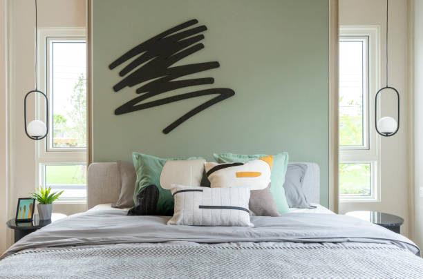 istock Modern bedroom interior with green wall and wall art. 1475864724