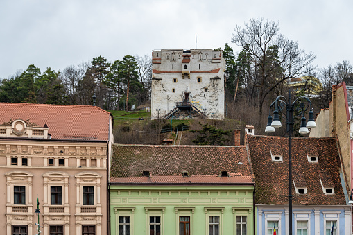 Brasov, Romania. March 15, 2023: The White Tower above Old town Brasov in Romania