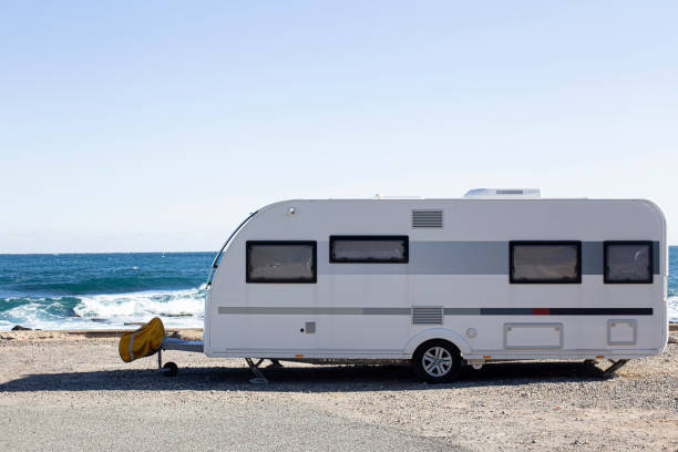 istock caravan car by the sea 1475866892