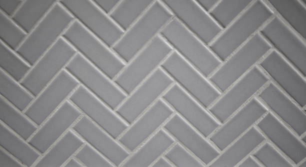 istock Gray Grey porcelain ceramic herringbone tile for a backsplash, kitchen, shower or bathroom 1475867445