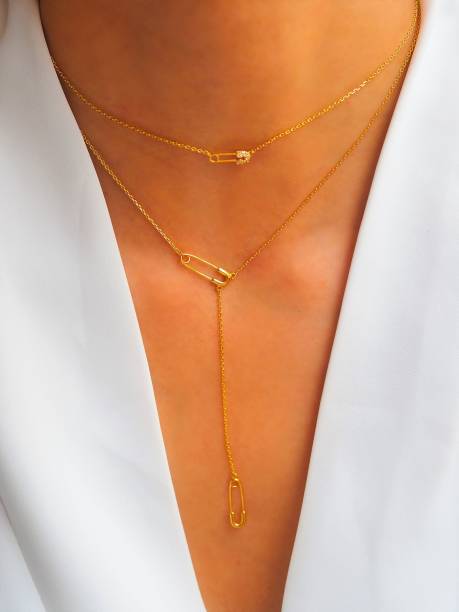 istock Necklaces accumulation on a white jacket 1475869198