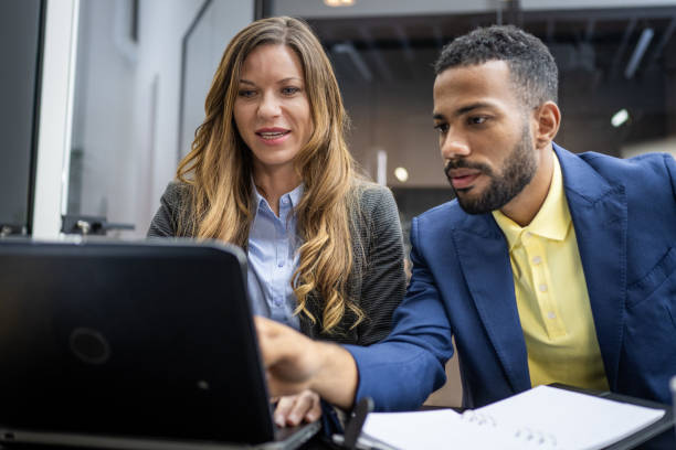 istock Coworker teamwork on laptop in meeting room 1475871802