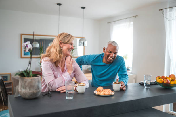 istock Handsome Mature Mixed Race Couple Flirting At Home 1475872881