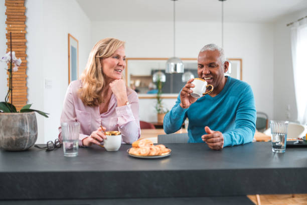 istock Handsome Mature Mixed Race Couple Flirting At Home 1475872893