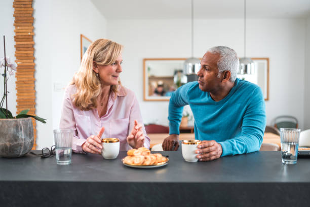 istock Handsome Mature Mixed Race Couple Flirting At Home 1475872897