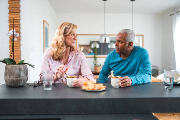istock Handsome Mature Mixed Race Couple Flirting At Home 1475872903
