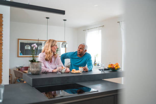 istock Handsome Mature Mixed Race Couple Flirting At Home 1475872907