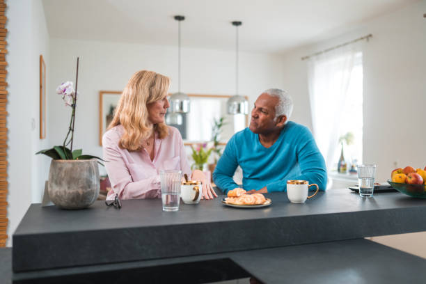 istock Handsome Mature Mixed Race Couple Flirting At Home 1475872941