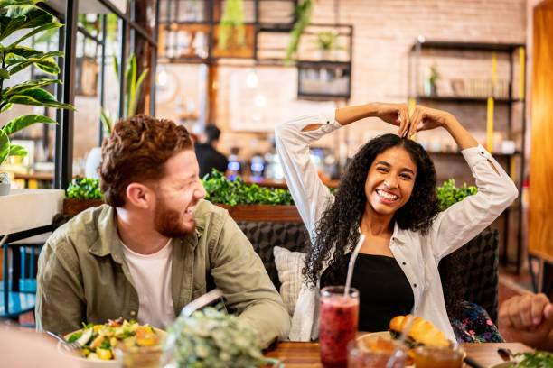 istock Friends talking and having fun on a restaurant 1475879113