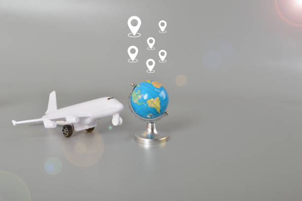 istock Aircraft with globe and destination symbols. 1475879296