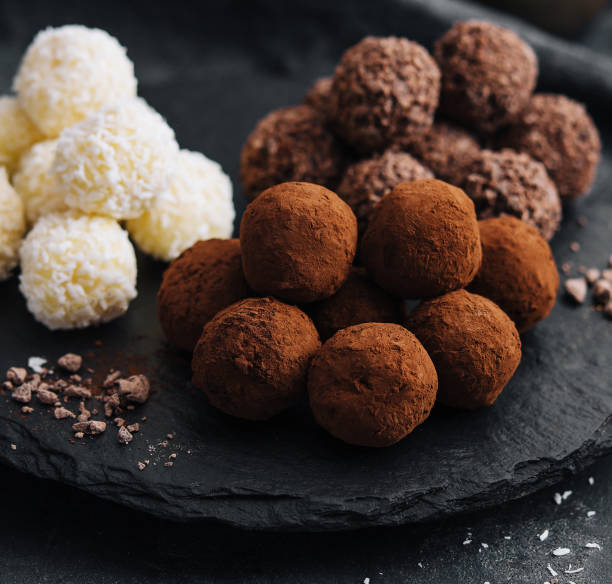 istock three types of chocolate balls on stone board 1475879676