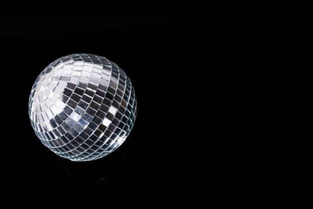 istock Mirror disco ball on black background. Brilliant decoration, silver decor. 1475881140