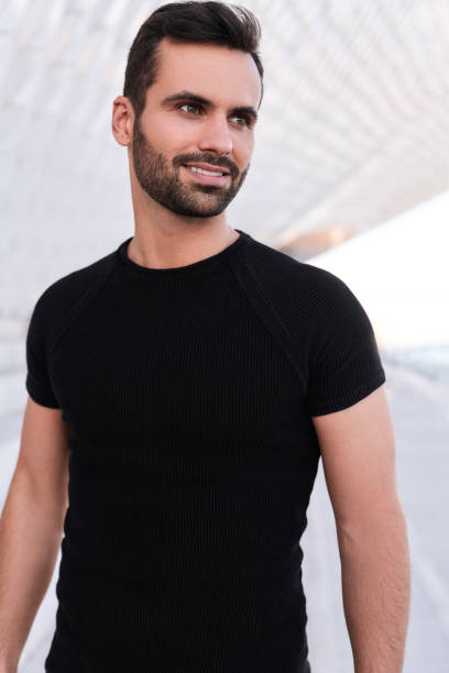 istock Handsome ethnic man on street 1475885458