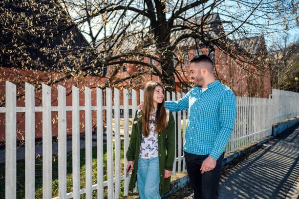 istock Father taking his daughter to school 1475888573