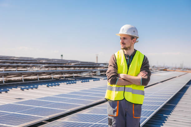 istock Portrait of a young worker cleaning solar panels 1475891716