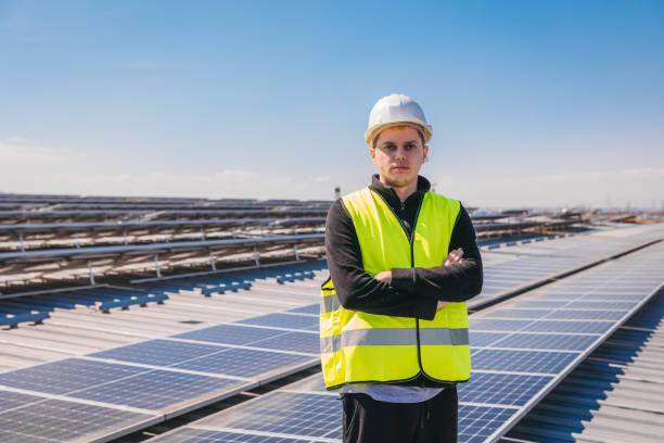 istock Portrait of a worker cleaning solar panels 1475891728