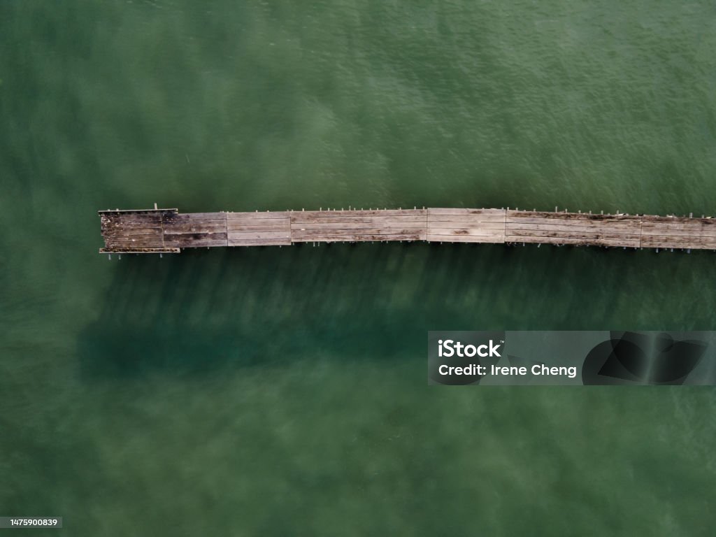 Aerial top view of a wooden pier Aerial View Stock Photo