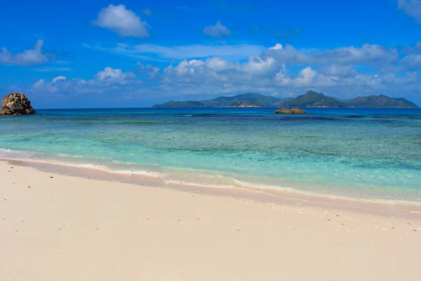 The blue waters off the Anse Reunion beaches on La Digue Island, Seychelles