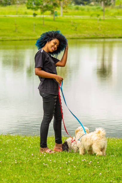 istock A young woman and her dogs. 1475914127