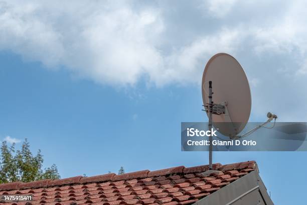 Satellite Dish On The Roof Stock Photo - Download Image Now - Antenna - Aerial, Communications Tower, Satellite Dish
