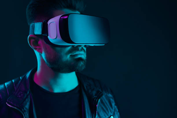 istock Man in VR goggles experiencing virtual world 1475933325