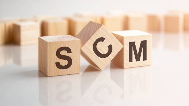 istock word SCM made with wood building blocks, stock image. background may have blur effect 1475934575