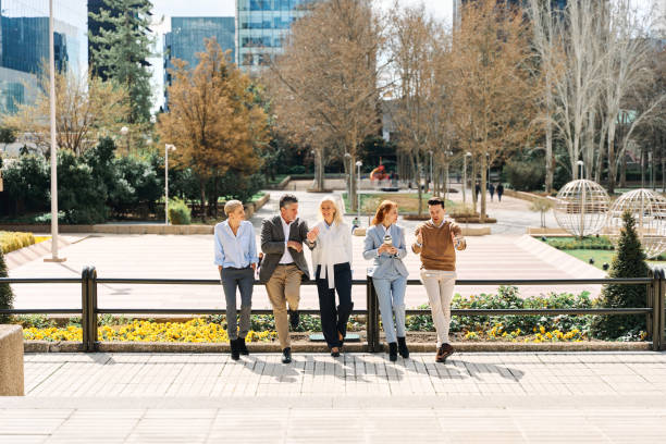 istock Business people in a coffee break in a park 1475945774