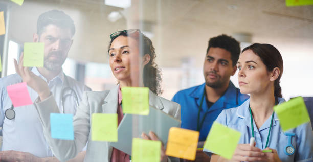 istock medical sales representative with clinical team 1475946448